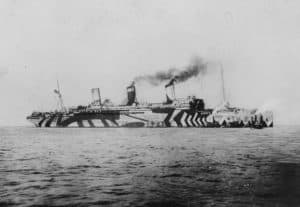 USS Leviathan, formerly the Hamburg-Amerika liner Vaterland, in “dazzle” camouflage. The Leviathan carried 96,804 American troops, among them the headquarters and one brigade of the 79th Division, to France. (U.S. Naval Historical Center)